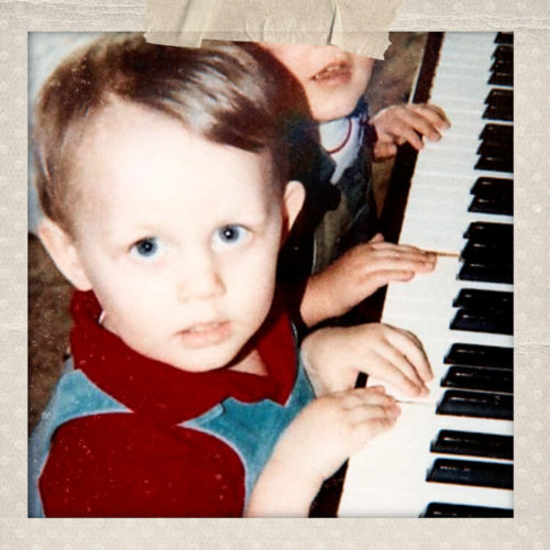 Labor of Love by Goosechase album cover shows a child playing piano.